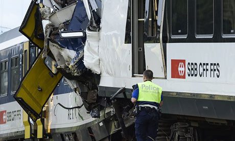 Train wreckage in Granges-pres-Marnand, Switzerland, after two regional services collided head-on