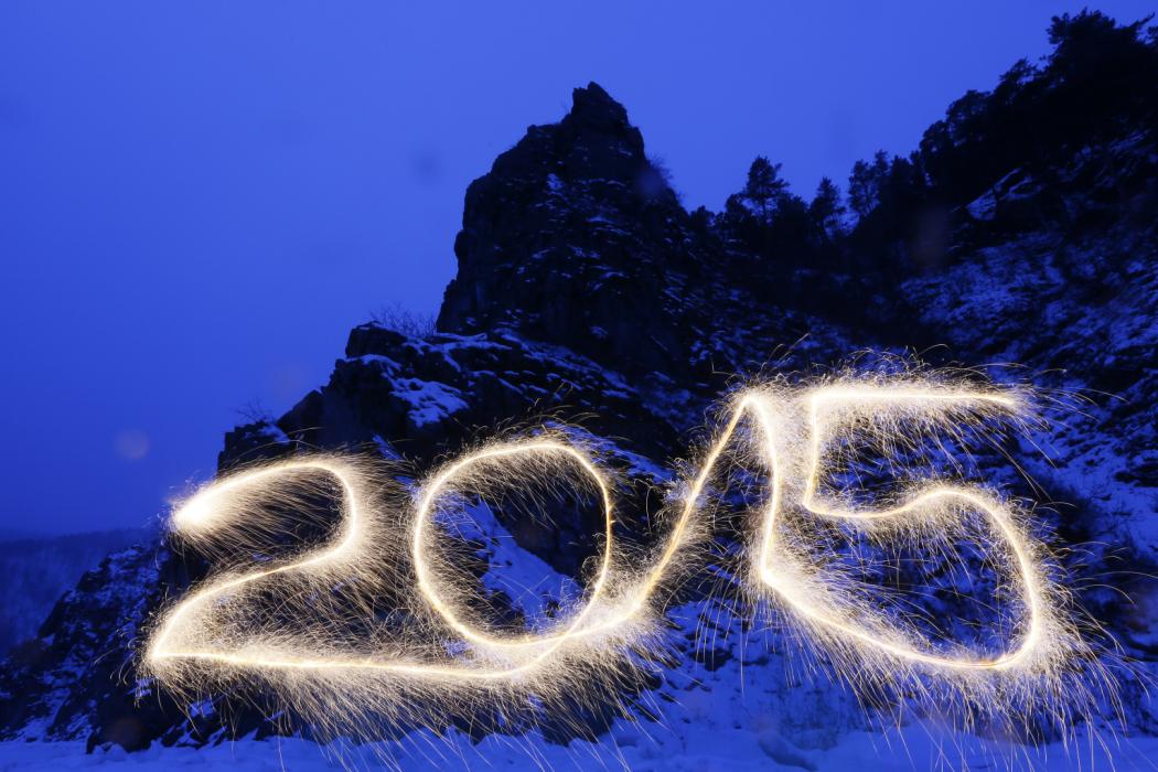 Number "2015" is written in the air with a sparkler at the frozen Mana River in the Taiga district outside Russia's Siberian city of Krasnoyarsk