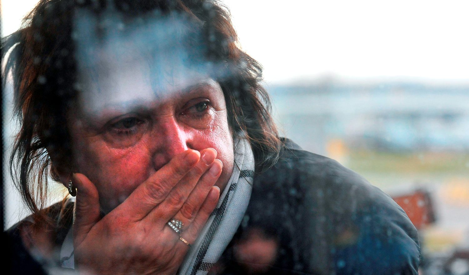 TOPSHOTS A relative reacts at Pulkovo in