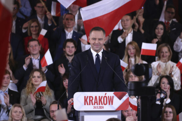 Karol Nawrocki, the head of Poland's state historical institute, speaks to a convention of Poland's conservative Law and Justice party after being tapped to be its candidate for president in an election next year, Sunday, Nov. 24, 2024, in Krakow, Poland. (AP Photo/Beata Zawrzel)